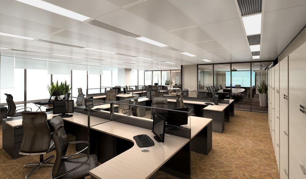 Modern office interior with workstations and glass partitions